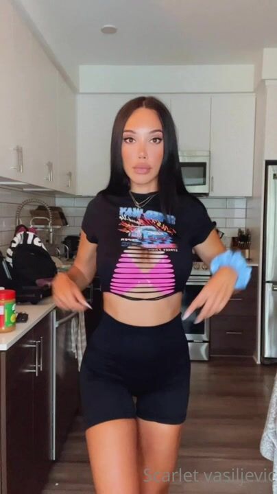 Scarlet Silva Stripteasing with Ass Slapping