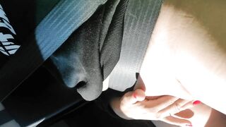 Masturbating in the Car While Her Husband Drives