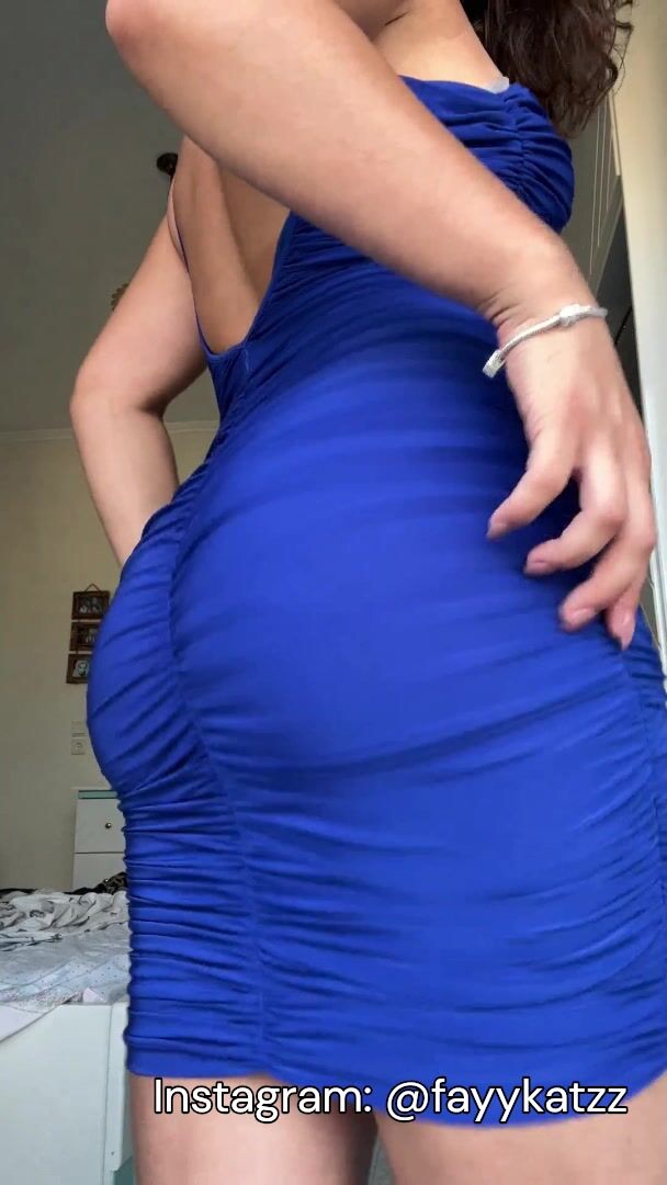 MILF in Blue Dress Shaking Her Ass