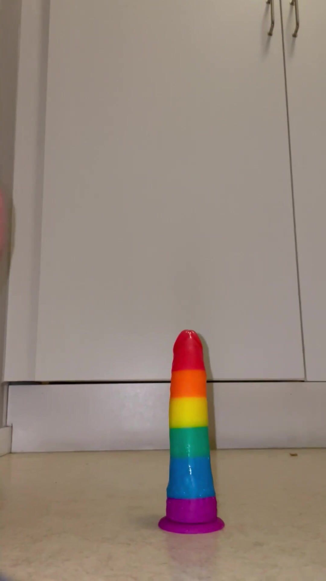 Swedish Nell Kronberg riding rainbow dildo