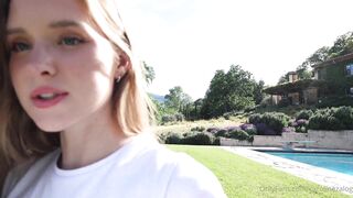 Caroline Zalog Trying On Clothes Outdoors