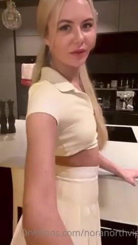 Emmaelise fingering pussy on the kitchen counter