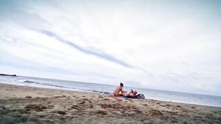 TASHA SINZ gives a Random Stranger a Handjob at the Nudist Beach