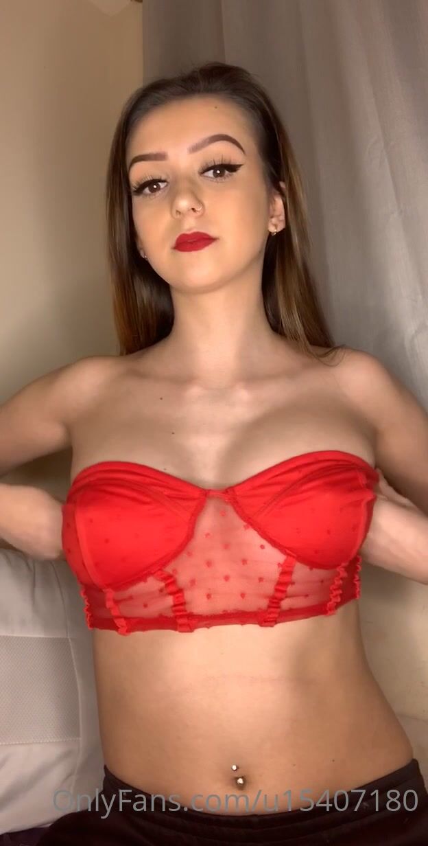 Antonia Ellax Strips To Show Big Tits